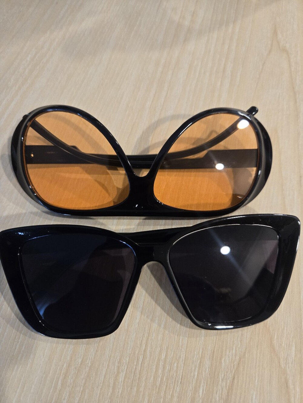 Women’s Black Frame Sunglasses with Orange Lens - Stylish Accent Shades
